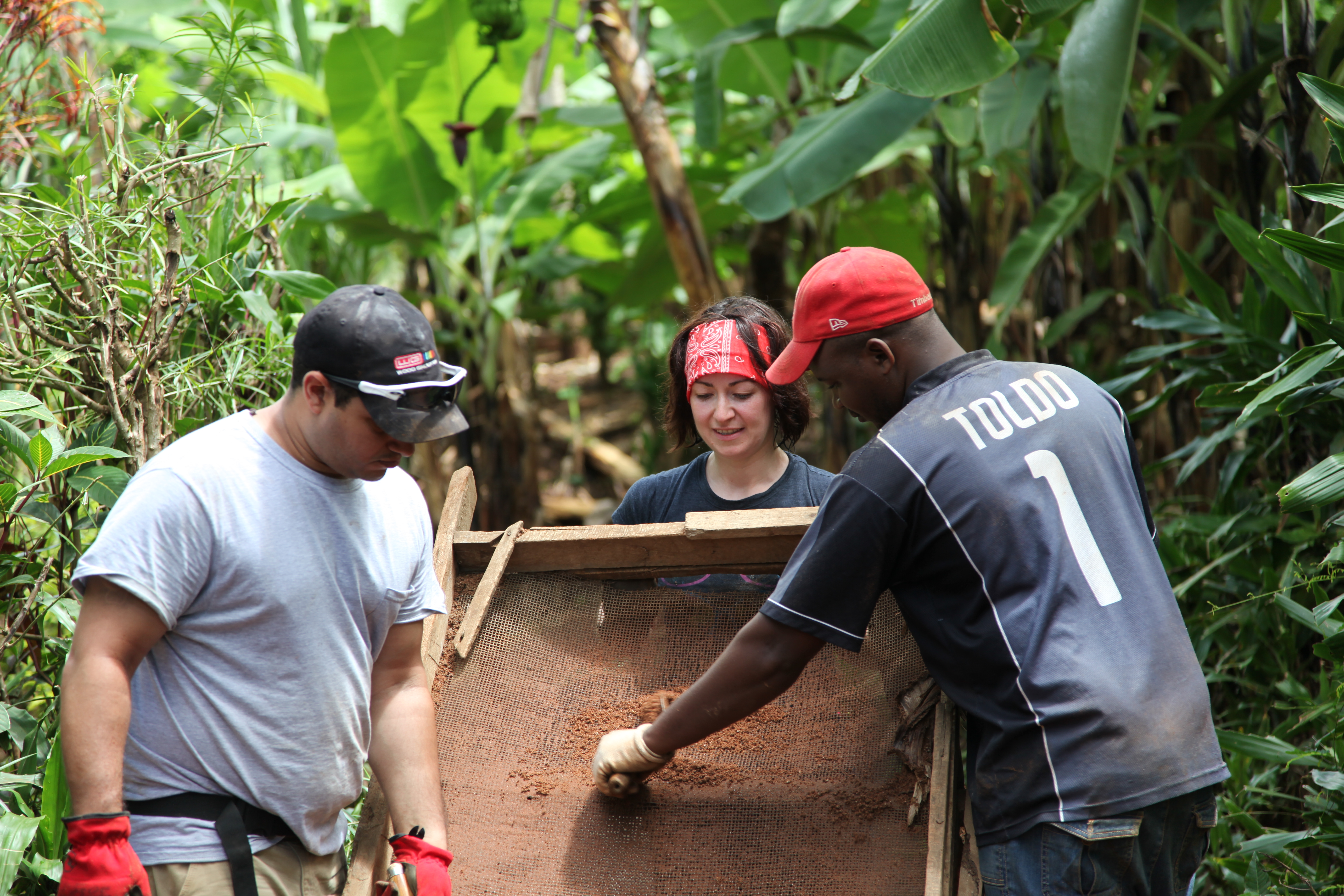 Team members working together on a building trip