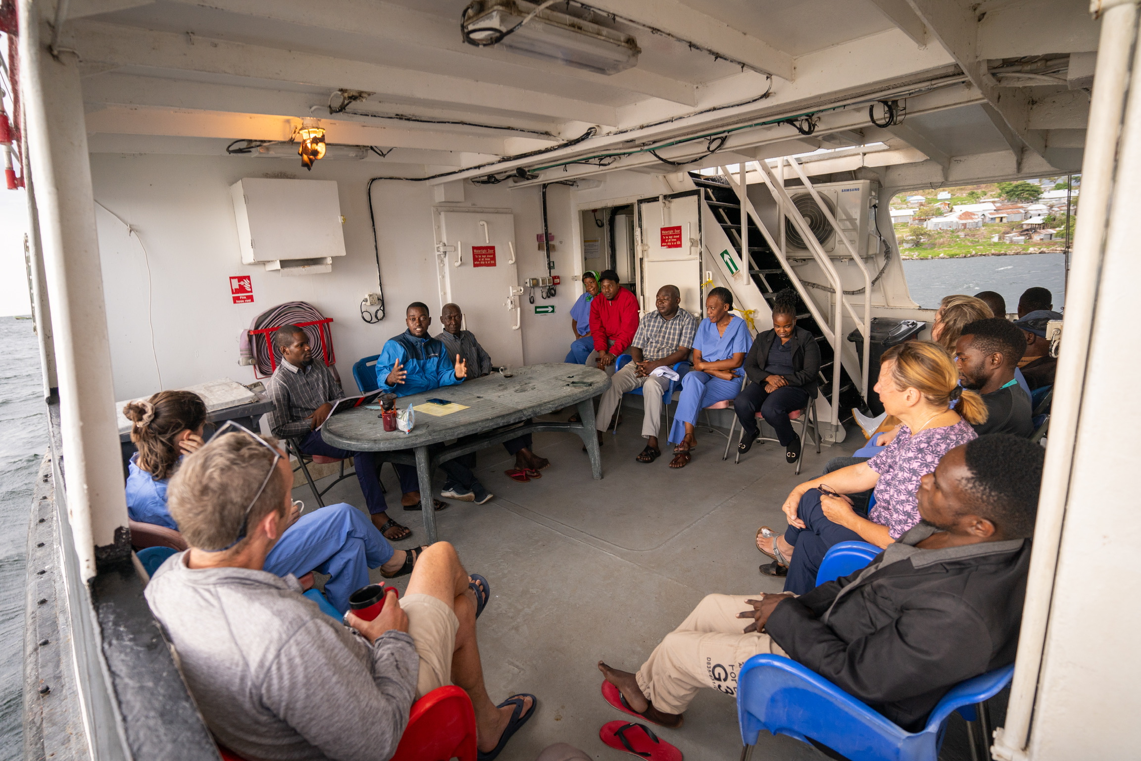 Smiling medical team aboard a Vine Trust ship