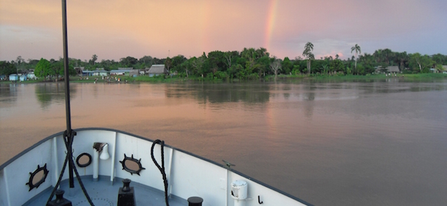 Image of ship's bow approaching village
